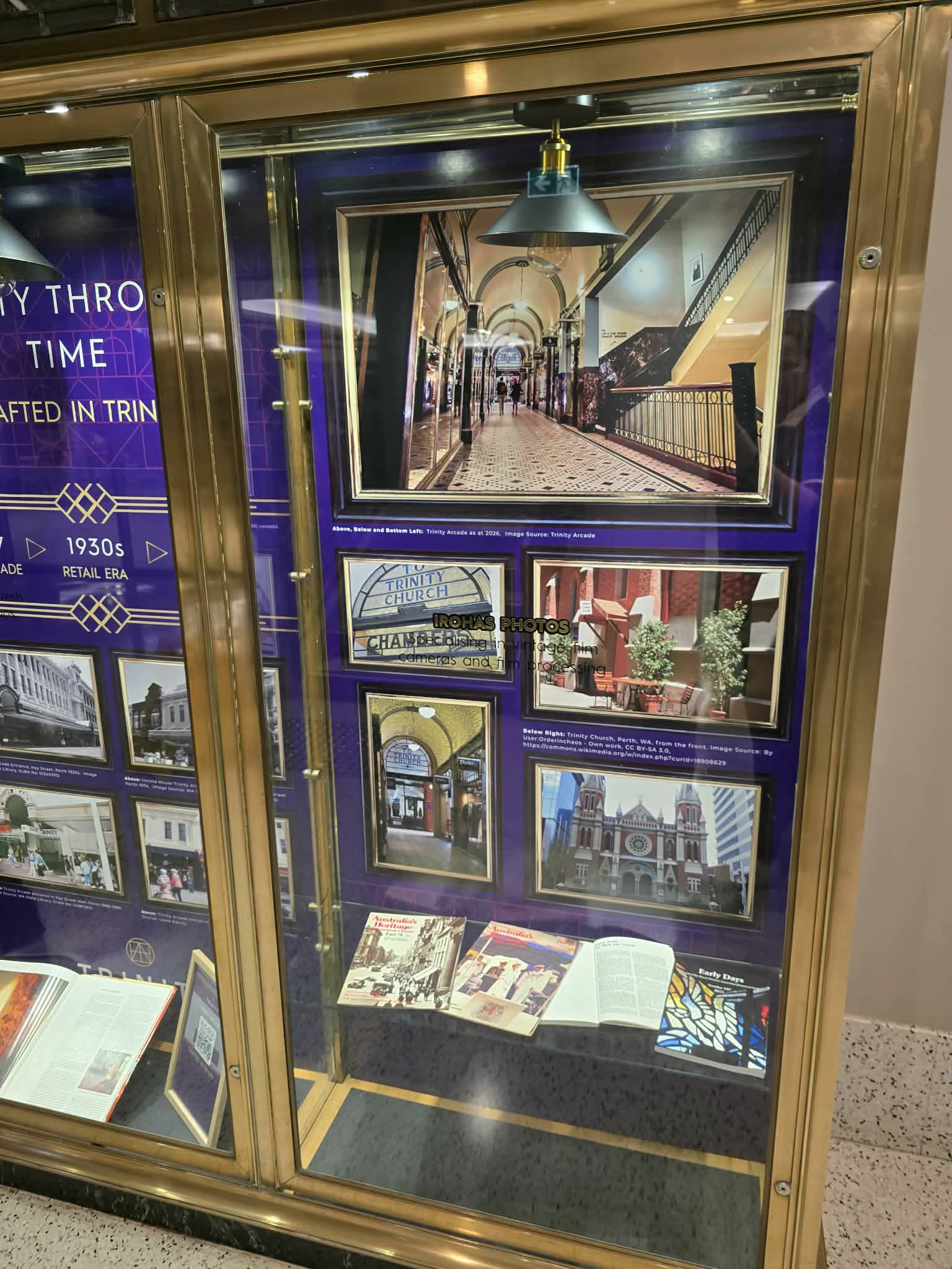 Trinity Through Time cabinet detail with archival imagery and printed narrative